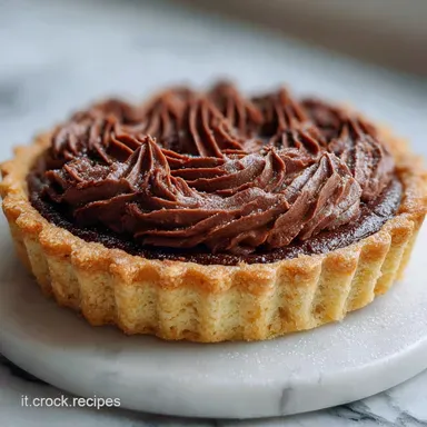 Crostata di Nutella: Pasta Frolla Perfetta in 50 Minuti Scheda ricetta